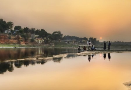 sunset on a river in india - town, sunset, people, river