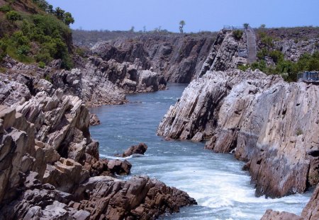 river narmada in india - gorge, flowing, cliffs, river