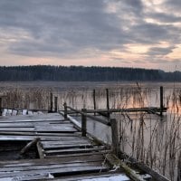 broken dock on a lake