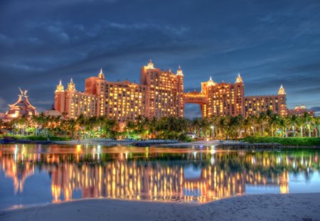 is reflected in the water - reflected, water, building, light