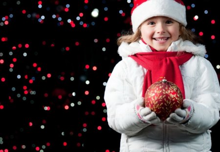 Magic of christmas - ornament, wonder, girl, magic, child, ball, scarf, gloves, sparkle, christmas, jacket, white, holding, red, santa hat hat, coat