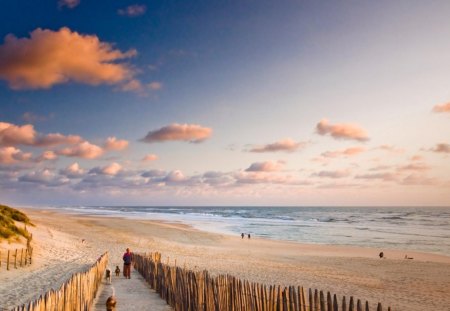 carcans beach in biscay gironde france - beach, sea, fence, clouds