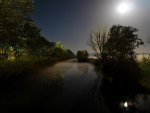 beautiful moon light over a canal