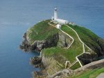 Lighthouse On A Cliff