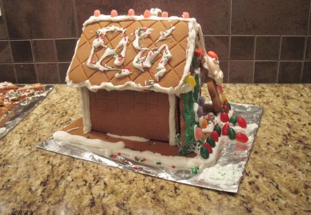 gingerbread house with white snow - white, candy, gingerbread, red, photography, green