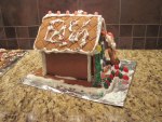 gingerbread house with white snow