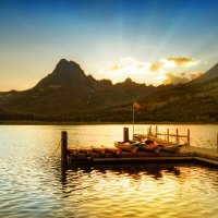 sunset on lake at glacier national park