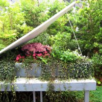 Wooden piano with flowers