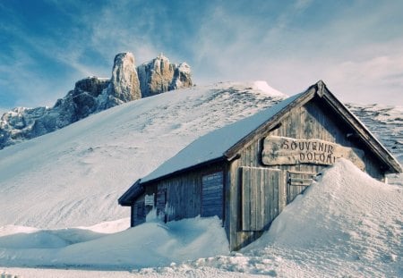 Snow-covered mountain cabin