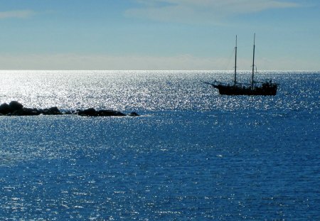 The Atlantic Ocean - sunshine, sky, ocean, sun, water, rocks, nature, blue, holiday, boat