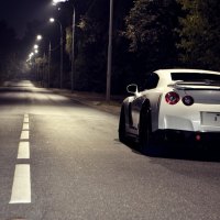 White Nissan 35 GTR at Night Rea