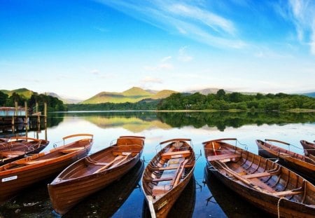 canoes on a calm lake - trees, hills, canoes, lake, dock