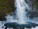 powerful waterfall in winter