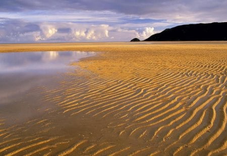 ripples in the sand on a broad beach - hill, clouds, beach, pool, ripples, sand