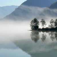 fog on a reflective lake