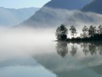 fog on a reflective lake