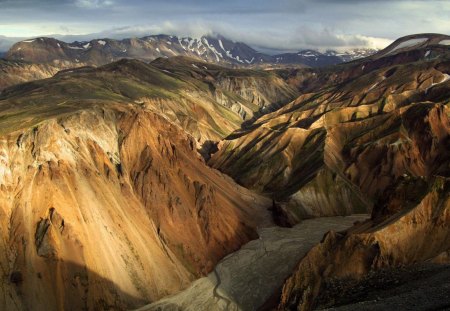 volcanic rock formation - clouds, hills, canyons, mountains