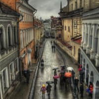 rain on street in old vienna austria hdr