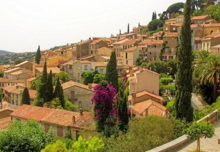 mountain village in provence france - village, red roofs, trees, mountain