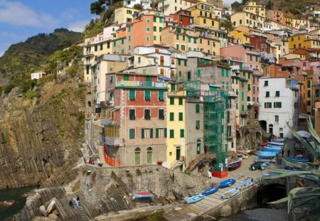 riomaggiore seaside village in italy - hill, seaside, village, boats, cliff