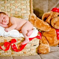 *** Sleeping child with a teddy bear ***