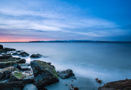 Sunset - winter, rocks, water, beauty, beautiful, frozen, peaceful, lake, winter time, sky, clouds, view, lovely, sunset, nature, cold