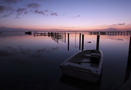 A New Day - boat, splendor, sunrise, sailboats, sailing, purple, sky, clouds, beautiful, sea, beauty, lovely, ocean, boats, nature, sunset, sailboat, peaceful