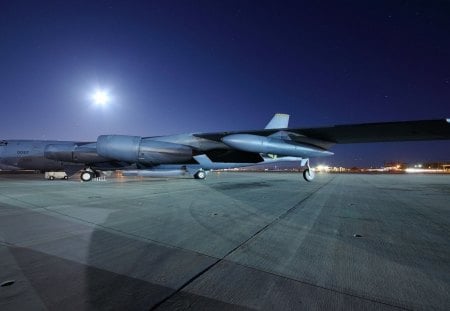 B52 bomber on the tamac - tamac, plane, lights, airport, night