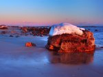 A beach at sunset