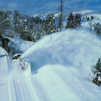 train clearing the track from snow