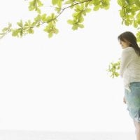 girl and a green tree