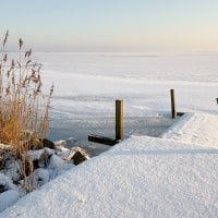 Snow-Covered Beach and Walkway