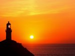 lighthouse at a magnificent sunset