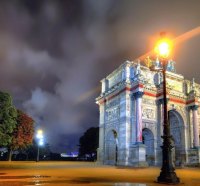 beautiful arch in a paris park after rain