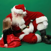 Little girl and Santa Claus