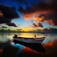 Small Boat on a Lake at Sunrise HDR