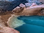 a pool of water in a glacier