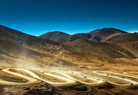 serpentine road in tibet mountains - vehicles, mountains, dust, desert, road