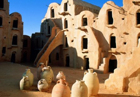 ancient ruins with pots in tunisia - pots, ancient, sand, ruins