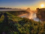 misty sunrise on rural river