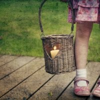 Little girl with a basket of love and light