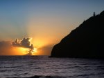 lighthouse watching a beautiful sunset