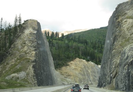 The magic day in between the two mountains - Mountains, highway, trees, cars, grey, green, photography, road