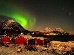 aurora borealis  above a northern village