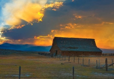 glorious sunset over old barn - fence, clouds, sunset, mountains, barn