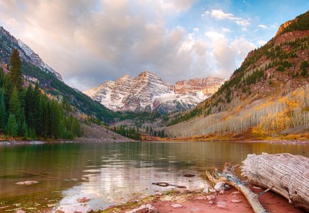 superb lakescape - lake, mountains, clouds, logs