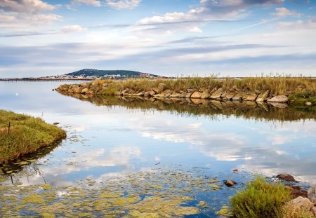 basin off the bay - clouds, grass, basin, rocks, pier, bay