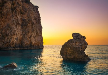 glorious sky over rock monuments - sky, yellow, sea, rocks