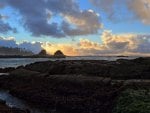 evening rain clouds over island