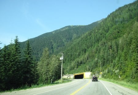 The Rockies mountains in BC - Canada 64 - Mountains, roads, trees, blue, photography, car, green, tunnel, sky